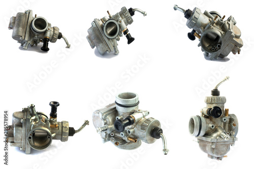 Carburetor for motorcycle part engine on white background photo