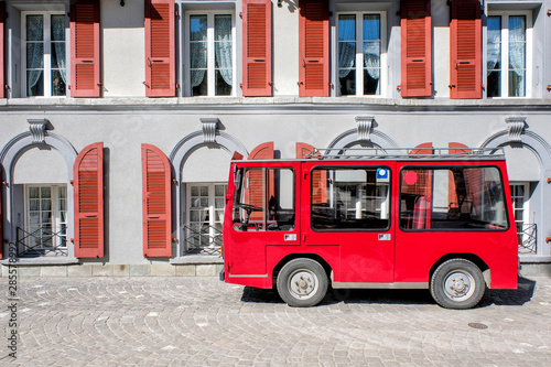 A Red taxi in front of train station in Zermatt, Switzerland