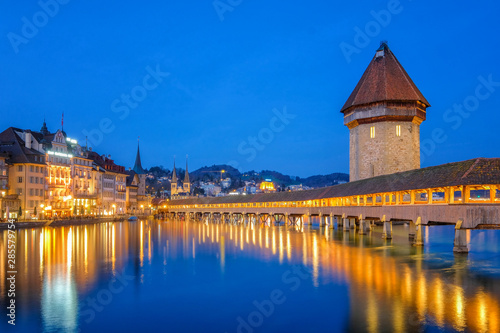 Nigth view of city center of Lucerne with famous Chapel Bridge and lake Lucerne (Vierwaldstatersee), Canton of Lucerne, Switzerland © sahachat
