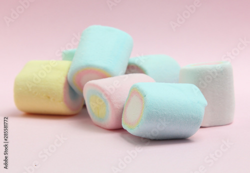 colorful marshmallows candy  on pink background