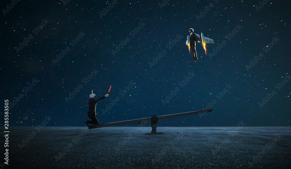 Two businessman in rocket suit try to fly with lever help ,business teamwork with success surreal concept . - obrazy, fototapety, plakaty 
