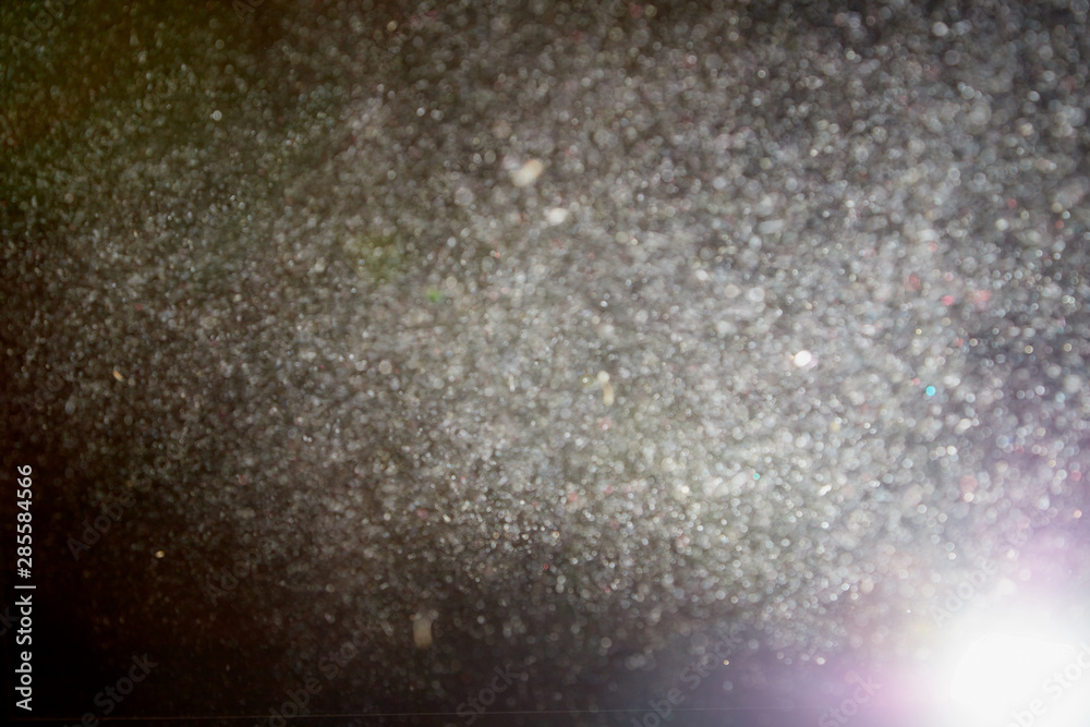 Powder effect of splash, flour or dust and flash on black background Powder effect of splash, flour or dust and flash on black background