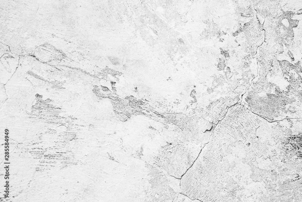 Texture of a concrete wall with cracks and scratches which can be used as a background