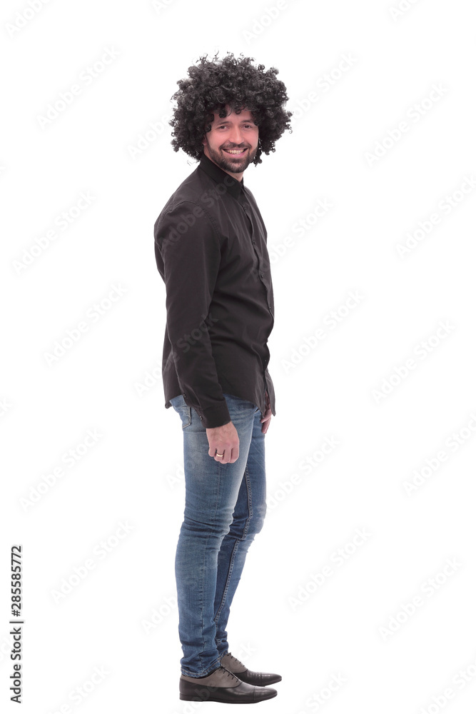 side view. smiling guy in jeans. isolated on white side view. smiling guy in jeans. isolated on white