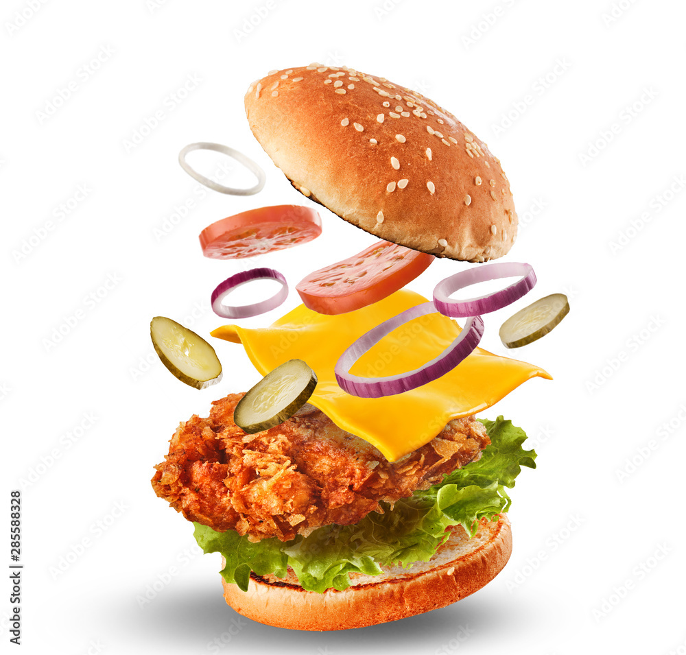 Burger with flying ingredients. Delicious monster Hamburger