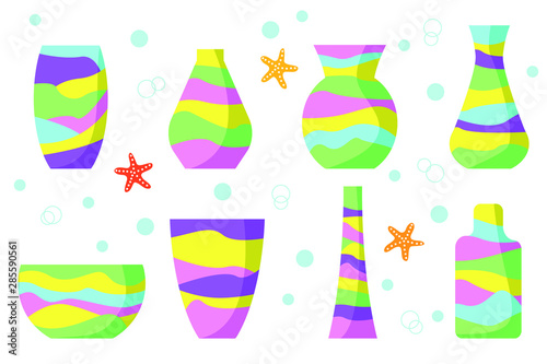 Set of glass transparent vases with colorful sea sand isolated on white background