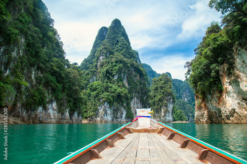 mountains lake river sky and natural attractions in Ratchaprapha Dam at Khao Sok National Park, Surat Thani Province, Thailand. © Poramet