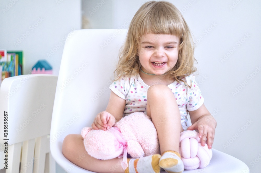little curly girl laughing