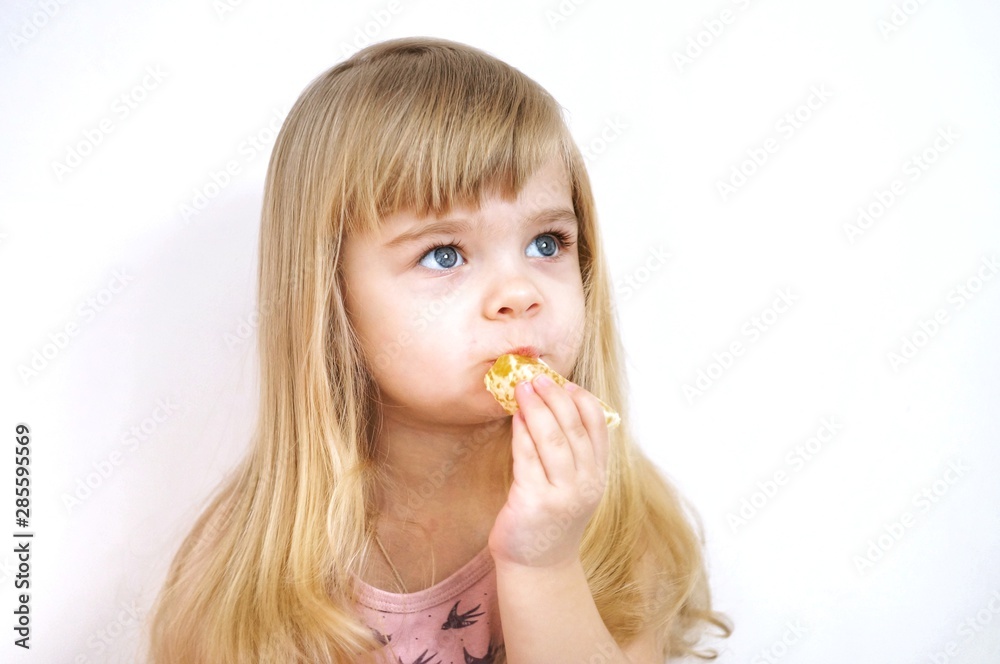 little girl with a slice of orange little girl with a slice of orange