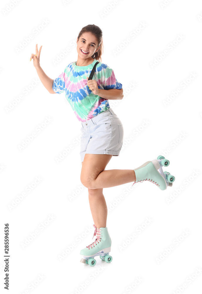 Teenage girl on roller skates against white background Teenage girl on roller skates against white background