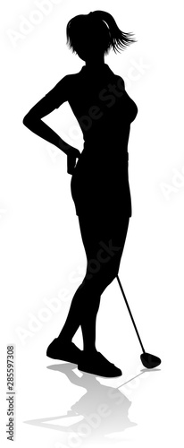 A female golfer sports person playing golf