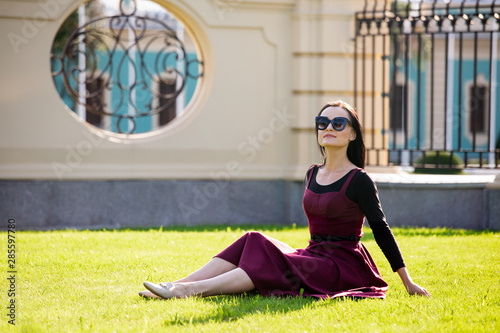 young beautyful girl woman posing in cyty park  photo