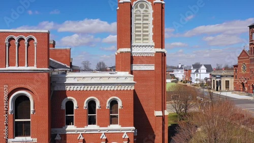 Aerial of a tree growing out of the top of a county courthouse in Greensburg, Indiana. photo