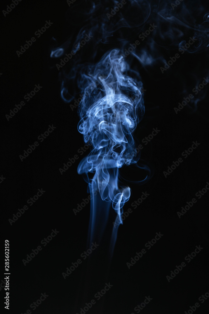 Blue wavy smoke on black background Blue wavy smoke on black background