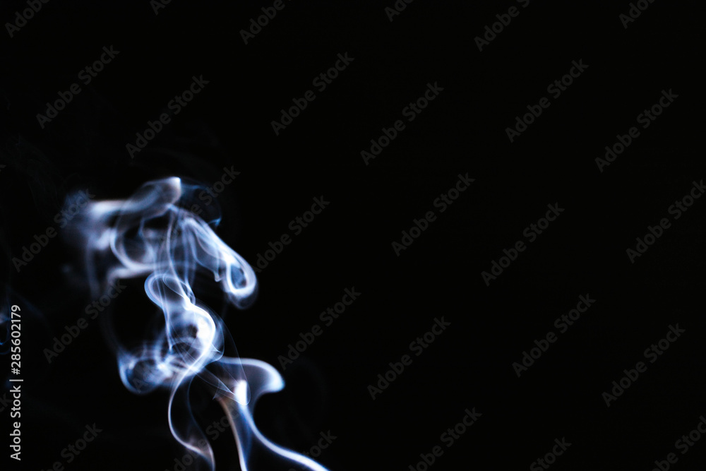 Blue wavy smoke on black background Blue wavy smoke on black background