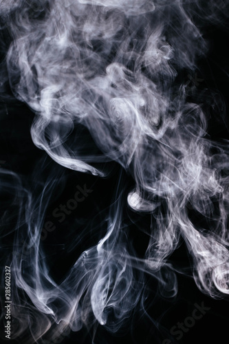 Wavy smoke on black background