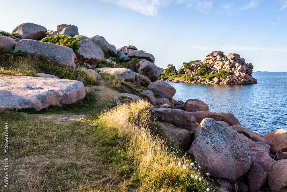 The Pors Rolland point on the Pink Granite Coast in northern Brittany, France, is a famous place in the pink granite blockfield of Ploumanac'h. The Pors Rolland point on the Pink Granite Coast in northern Brittany, France, is a famous place in the pink granite blockfield of Ploumanac'h.
