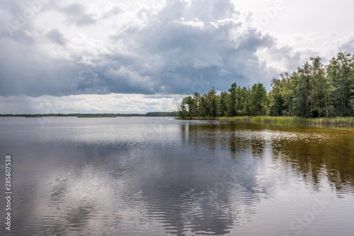 Fototapeta Naklejka Na Ścianę i Meble -  Long Exposure of a Lake in Latvia on a Cloudy Day