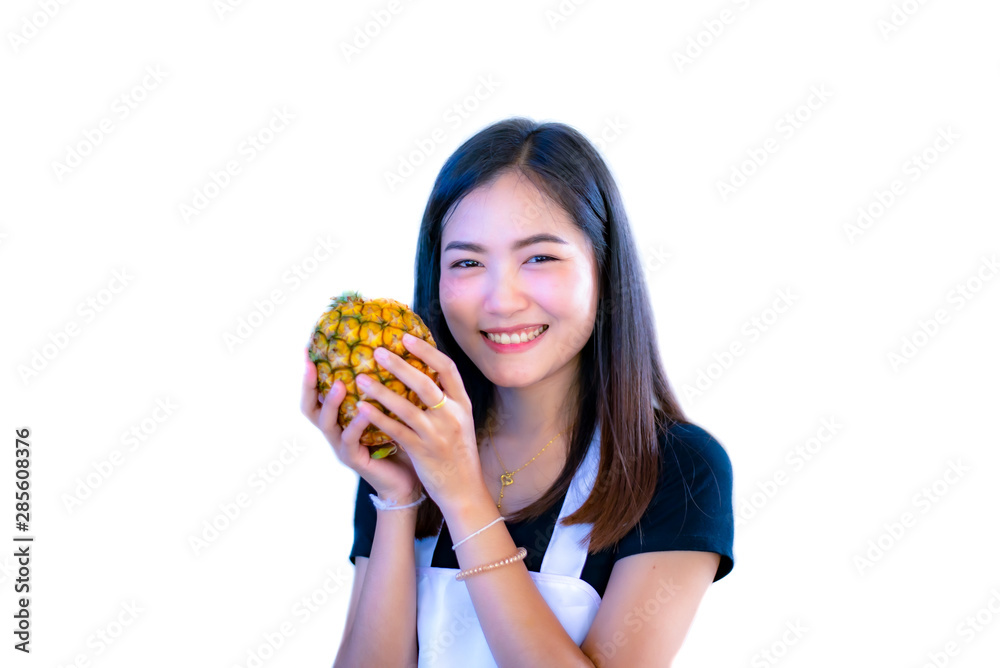 Portrait of Asia girl holding pineapple on white background