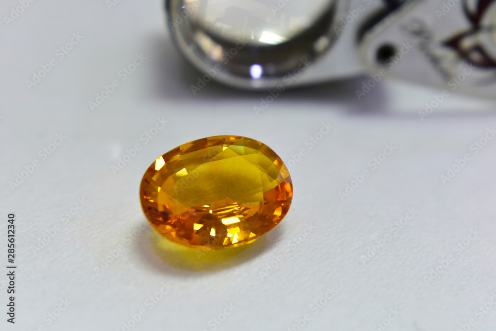 Yellow gemstone is a natural gemstone that has been cut through Is an expensive gem Yellow gemstone is a natural gemstone that has been cut through Is an expensive gem