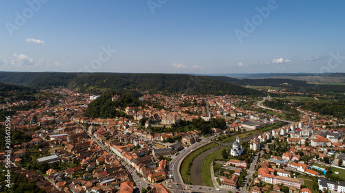 Aerial footage of an old eastern Europe town on a sunny day