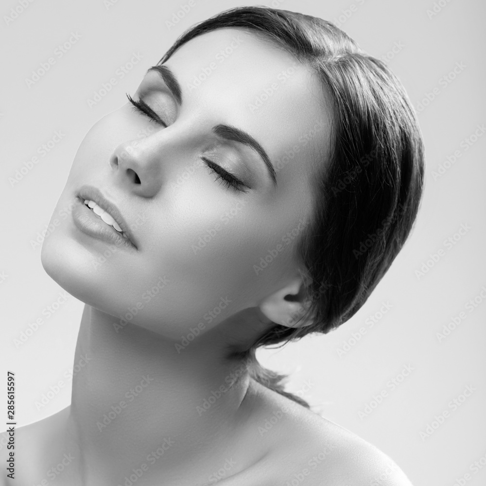 Fototapeta premium young woman with closed eyes
