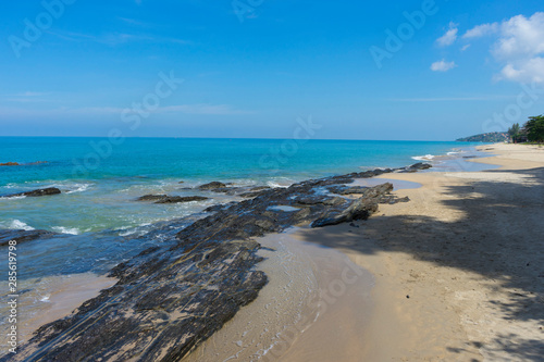 Beautiful beach and rock with blue sky in Koh Lanta, Thailand.