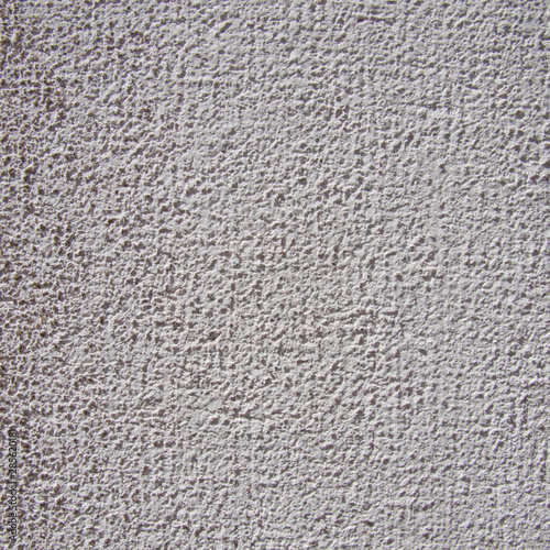 White rough plaster wall texture. close up