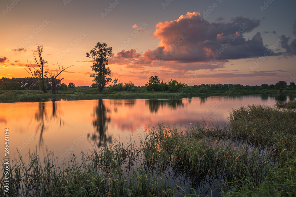 Sunset over the Bzura river near Kamion, Masovia, Poland