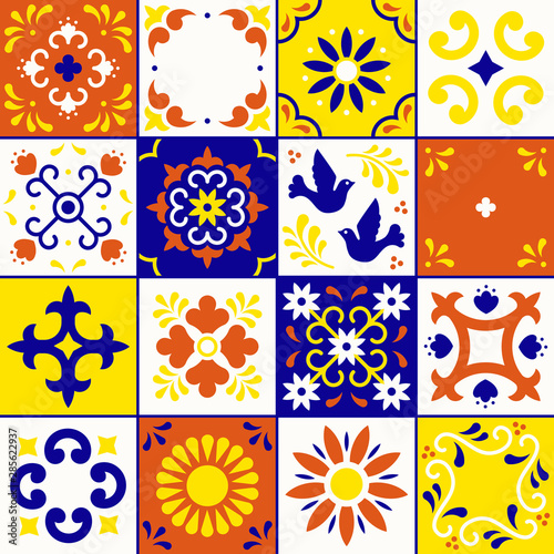 Mexican talavera pattern. Ceramic tiles with flower, leaves and bird ornaments in traditional style from Puebla. Mexico floral mosaic in blue, terracotta, yellow and white. Folk art design.