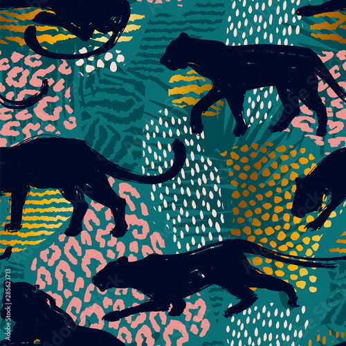 Photography Seamless exotic pattern with abstract silhouettes of wild cats.