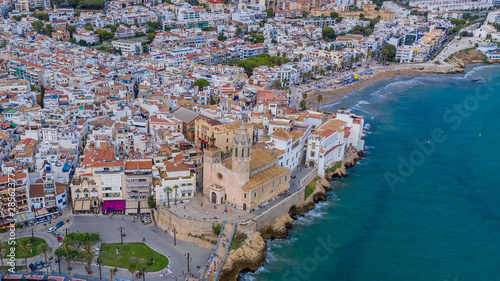 Amazing summer Barcelona Sitges Spain. Church of San Bartolome and Santa Tecla photo