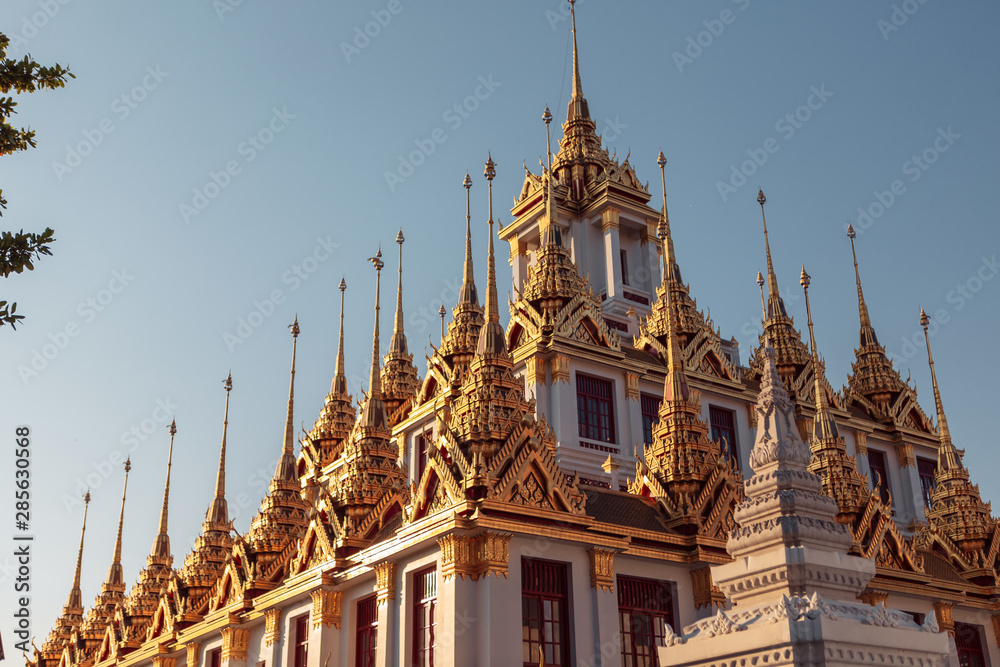 Fototapeta premium Loha Prasat, the golden and iron monastery in Wat Ratchanatdaram, Bangkok, Thailand