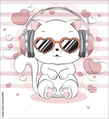 white kitten with earphones