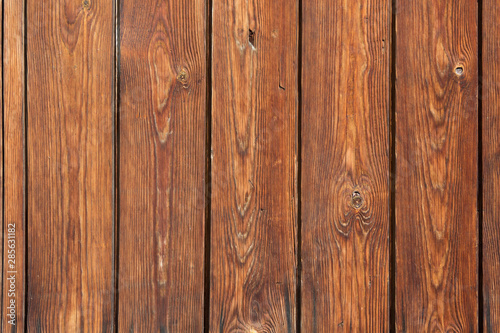 Brown wooden background from old yellow black planks