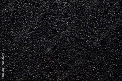 dark wet asphalt road texture