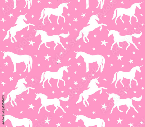 Vector seamless pattern of white unicorn silhouette isolated on pastel pink background