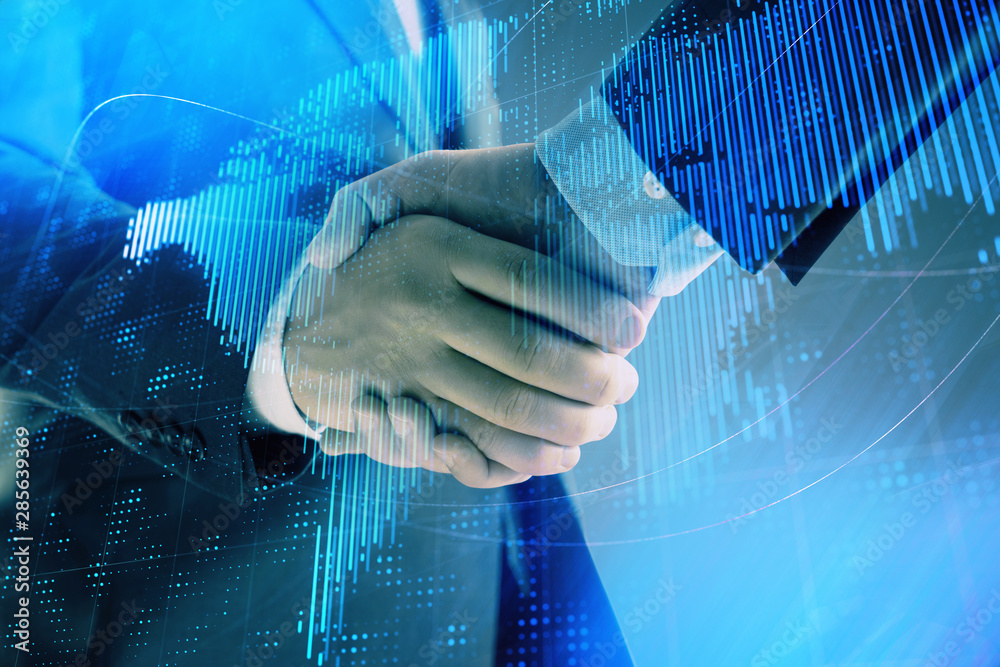 Multi exposure of world map on abstract background with two businessmen handshake. Concept of international business Multi exposure of world map on abstract background with two businessmen handshake. Concept of international business