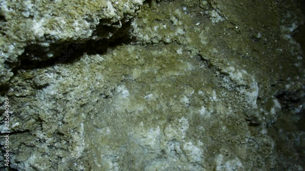 Underground caves inside view, rock formations and stalactites Underground caves inside view, rock formations and stalactites