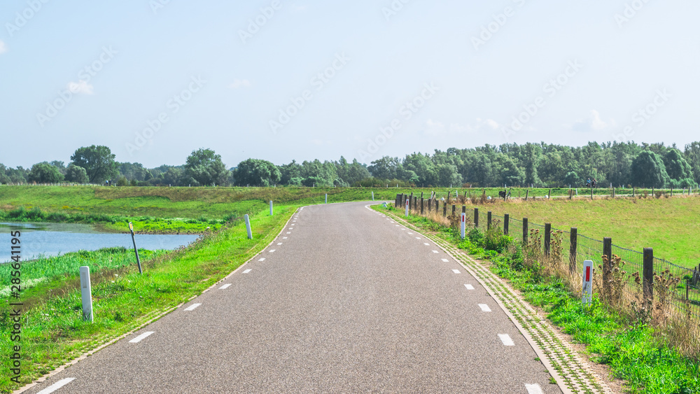 Fototapeta premium Bend in Dyke Dutch polder landscape
