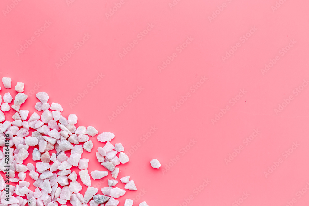 little stones pattern on pink background top view little stones pattern on pink background top view