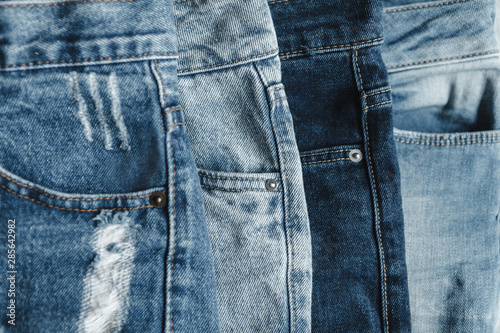 several pairs of jeans close-up