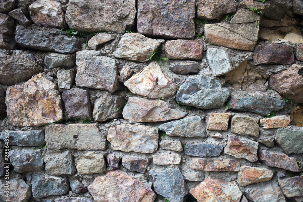 old stone wall of stones old stone wall of stones