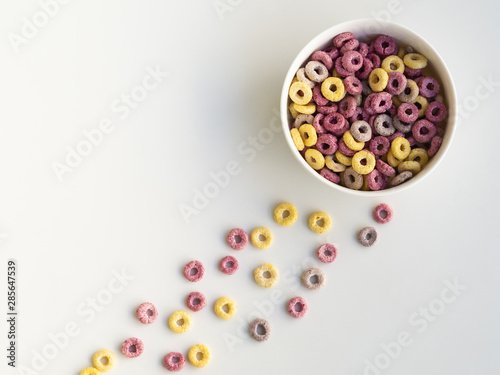 Bowl of colorful cereals top view