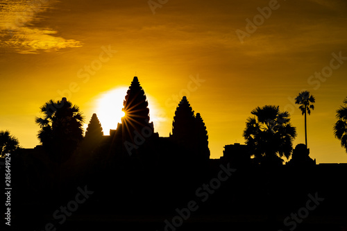 Silhouette ancient temple complex Angkor Wat with morning Sunrise  wonderful orange sky  Siem Reap Cambodia