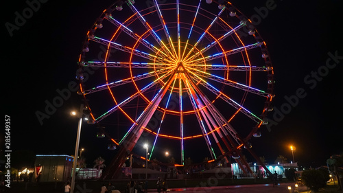 Ferris wheel an night in Batumi, Georgia. Promenade In Miracle Park, Amusement City Park in Night Time