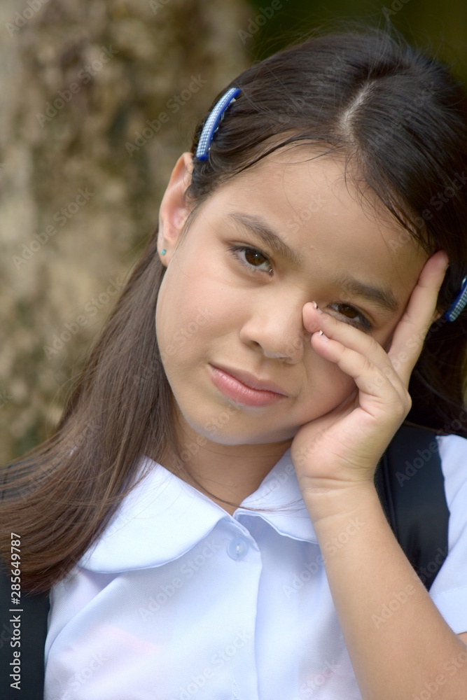 Minority Girl Student Thinking Wearing Uniform Minority Girl Student Thinking Wearing Uniform
