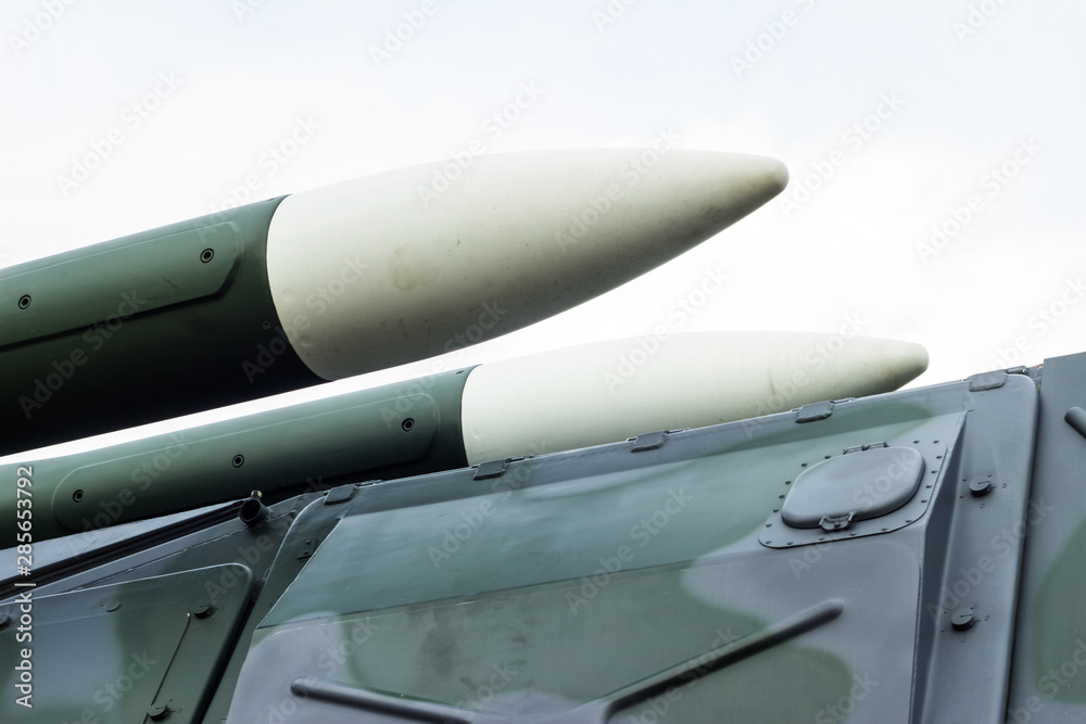 Anti-aircraft missile system. Green army vehicle. Close up view Anti-aircraft missile system. Green army vehicle. Close up view