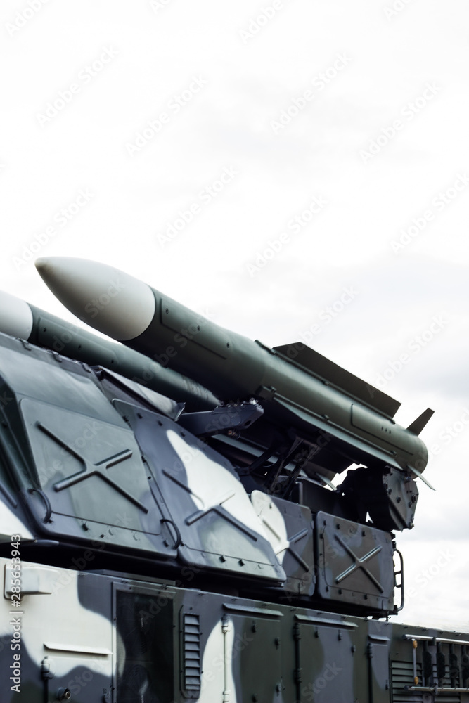 Anti-aircraft missile system. Green army vehicle. Close up view Anti-aircraft missile system. Green army vehicle. Close up view