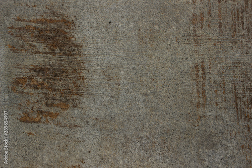 Cement surface sidewalk background. Rusty marks